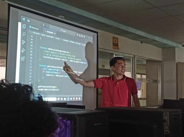 KaSocius founder leading JavaScript training session for students